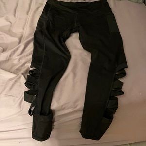 VSX black workout leggings with cross cross cut out detail